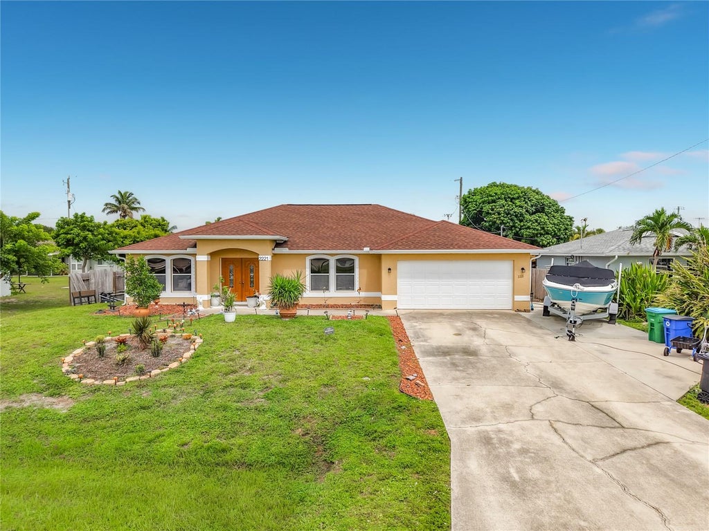 Photo of 2221 SW 3rd Avenue, Cape Coral, FL 33991 (MLS # D6148276)