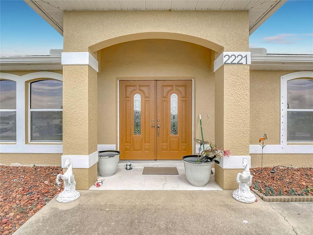 Photo of 2221 SW 3rd Avenue, Cape Coral, FL 33991 (MLS # D6148276)