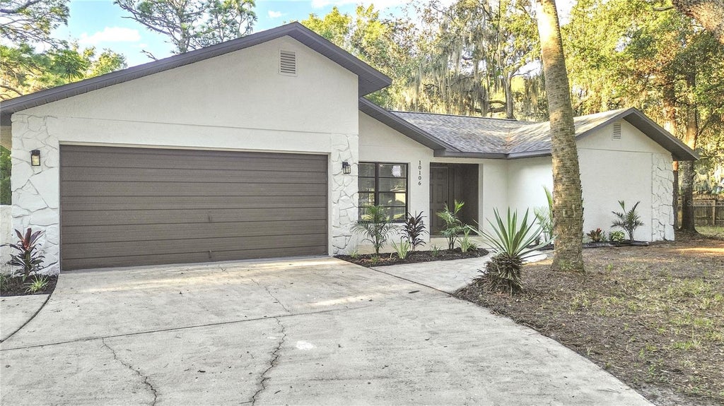 Photo of 10106 Lakeview Drive, New Port Richey, FL 34654 (MLS # TB8558664)