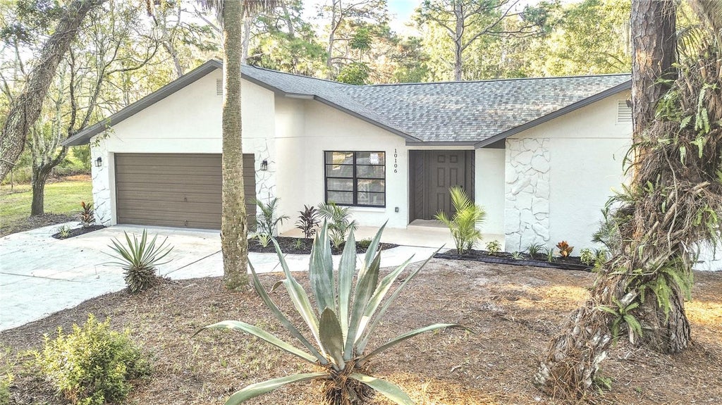Photo of 10106 Lakeview Drive, New Port Richey, FL 34654 (MLS # TB8558664)