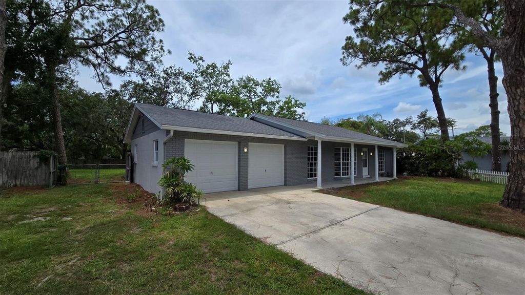 Photo of 8328 W Pocahontas Avenue, Tampa, FL 33615 (MLS # TB8407221)