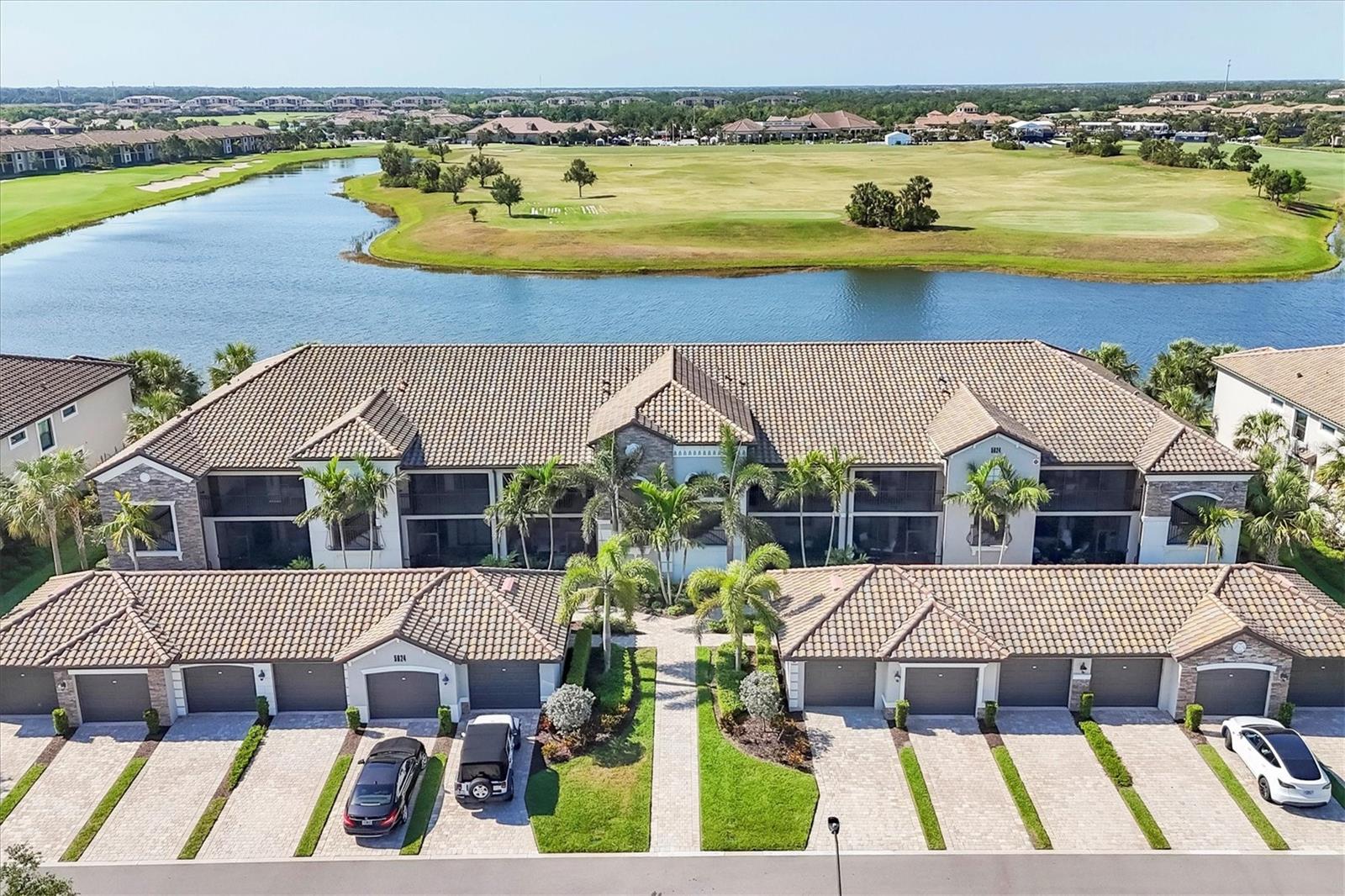 Stunning Water Views & Designer Finishes – A Truly Exceptional Rental Opportunity! Welcome to the dream unit you've been waiting for, now available in the highly desirable Lakewood National, a one of a kind all-inclusive golf community nestled within Lakewood Ranch. This beautifully furnished, turnkey 2-bedroom + den/office, 2-bath condo with a private garage offers breathtaking water views and overlooks a top-ranked golf course—making it the perfect retreat for relaxation and entertainment. Step inside and be wowed by the custom upgrades throughout, including a spacious gourmet kitchen with upgraded lighting, a stylish backsplash, soft-close cabinetry, and a large pantry. Enjoy morning coffee in the front screened-in porch off the eat-in kitchen or unwind in the rear screened lanai with tranquil views. The open-concept living and dining area flows effortlessly, ideal for hosting guests or simply enjoying peaceful evenings at home. The primary suite features soaring ceilings with elegant wall trim, a custom-built desk with filing cabinets, and a spa-inspired ensuite. The guest bedroom is located at the opposite end of the home for added privacy, while the versatile den/office includes a high-end Murphy bed—perfect for guests or a productive work-from-home setup. Additional highlights include custom closets, a well-appointed laundry room, and designer furnishings throughout that elevate this unit to a league of its own. Whether you're looking for a luxurious seasonal escape or a long-term stay in one of Florida’s premier communities, this unit is not to be missed! Resort-Style Amenities Include: Two championship 18-hole golf courses, Resort pool with full-service tiki bar, Full-service spa, 8 clay tennis courts and 4 pickleball courts, State-of-the-art fitness center, 2 bocce ball courts, Full-time lifestyle director and Newly opened Grand Clubhouse! Lakewood National offers an unbeatable lifestyle with endless activities just outside your door. You're also minutes from Gulf beaches, upscale shopping, dining, and have easy access to I-75 and everything Lakewood Ranch has to offer. Life is what you lifestyle is how you live it! Monthly Rate (December - April): $6,750.00 Don't miss your chance to experience the Florida lifestyle at its finest!