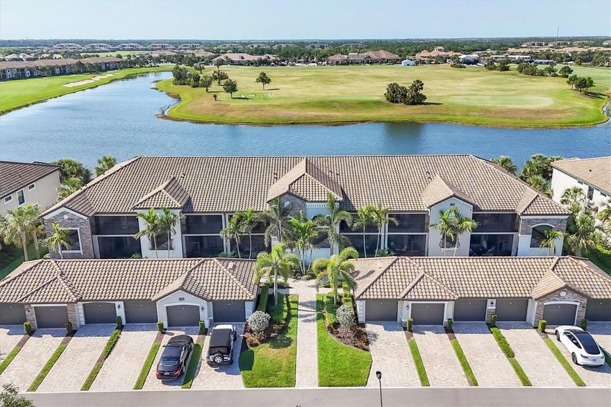 Stunning Water Views & Designer Finishes – A Truly Exceptional Rental Opportunity! Welcome to the dream unit you've been waiting for, now available in the highly desirable Lakewood National, a one of a kind all-inclusive golf community nestled within Lakewood Ranch. This beautifully furnished, turnkey 2-bedroom + den/office, 2-bath condo with a private garage offers breathtaking water views and overlooks a top-ranked golf course—making it the perfect retreat for relaxation and entertainment. Step inside and be wowed by the custom upgrades throughout, including a spacious gourmet kitchen with upgraded lighting, a stylish backsplash, soft-close cabinetry, and a large pantry. Enjoy morning coffee in the front screened-in porch off the eat-in kitchen or unwind in the rear screened lanai with tranquil views. The open-concept living and dining area flows effortlessly, ideal for hosting guests or simply enjoying peaceful evenings at home. The primary suite features soaring ceilings with elegant wall trim, a custom-built desk with filing cabinets, and a spa-inspired ensuite. The guest bedroom is located at the opposite end of the home for added privacy, while the versatile den/office includes a high-end Murphy bed—perfect for guests or a productive work-from-home setup. Additional highlights include custom closets, a well-appointed laundry room, and designer furnishings throughout that elevate this unit to a league of its own. Whether you're looking for a luxurious seasonal escape or a long-term stay in one of Florida’s premier communities, this unit is not to be missed! Resort-Style Amenities Include: Two championship 18-hole golf courses, Resort pool with full-service tiki bar, Full-service spa, 8 clay tennis courts and 4 pickleball courts, State-of-the-art fitness center, 2 bocce ball courts, Full-time lifestyle director and Newly opened Grand Clubhouse! Lakewood National offers an unbeatable lifestyle with endless activities just outside your door. You're also minutes from Gulf beaches, upscale shopping, dining, and have easy access to I-75 and everything Lakewood Ranch has to offer. Life is what you lifestyle is how you live it! Monthly Rate (December - April): $6,750.00 Don't miss your chance to experience the Florida lifestyle at its finest!