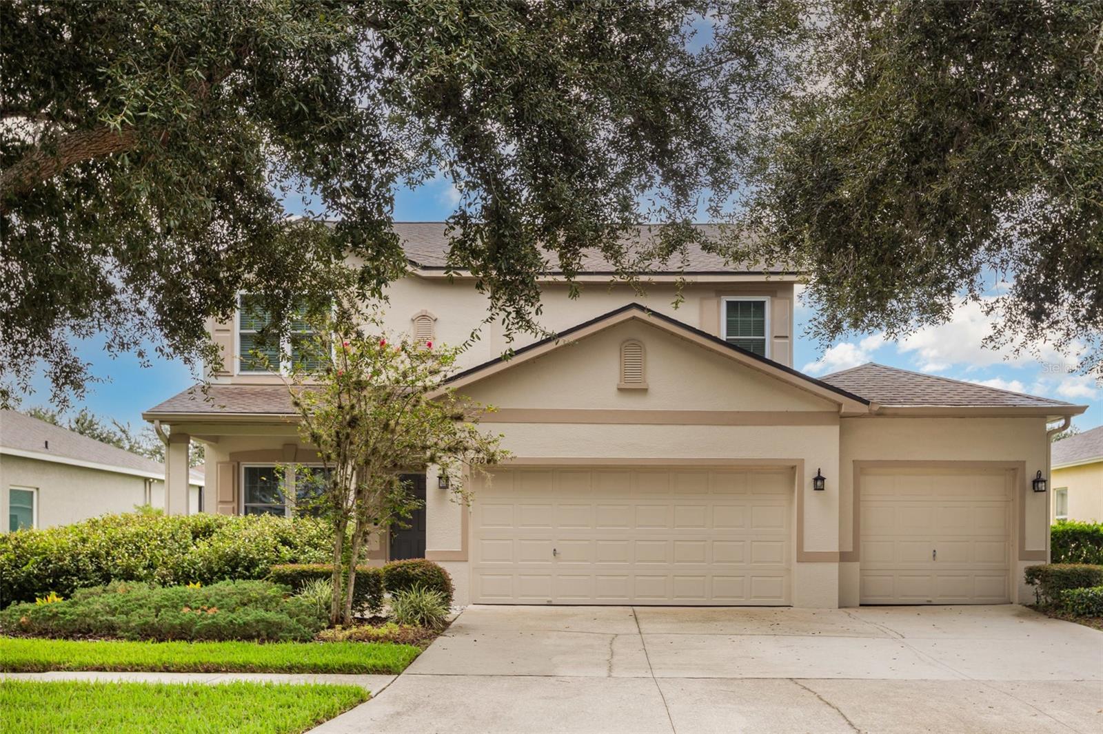 Welcome to 6308 Bridgevista Drive, a beautifully maintained 5-bedroom, 3.5-bath home offering over 2,600 sq. ft. of living space in one of Lithia’s most desirable communities. From the moment you arrive, the inviting front porch and curb appeal set the tone for the charm inside.
New roof 2023, remodeled master bathroom, new carpet and vinyl flooring 2024.
Step through the front door into a bright, split floor plan designed for both everyday living and entertaining. The updated kitchen features new stainless-steel appliances, abundant cabinetry, and a spacious island that flows seamlessly into the dining and living areas. Elegant touches like crown molding and a custom built-in entertainment unit bring style and function together.
The main-floor primary suite offers privacy and comfort, while four additional bedrooms on the second floor provide space for family, guests, or a home office. With multiple living areas, there’s room for everyone to spread out.
Outside, enjoy Florida living with a covered front porch and backyard space perfect for grilling or relaxing. Additional features include a 3-car garage, central cooling, and stucco exterior for low-maintenance living.
Located in the sought-after Fishhawk Ranch community, you’ll have access to top-rated schools, resort-style amenities, parks, and trails.
