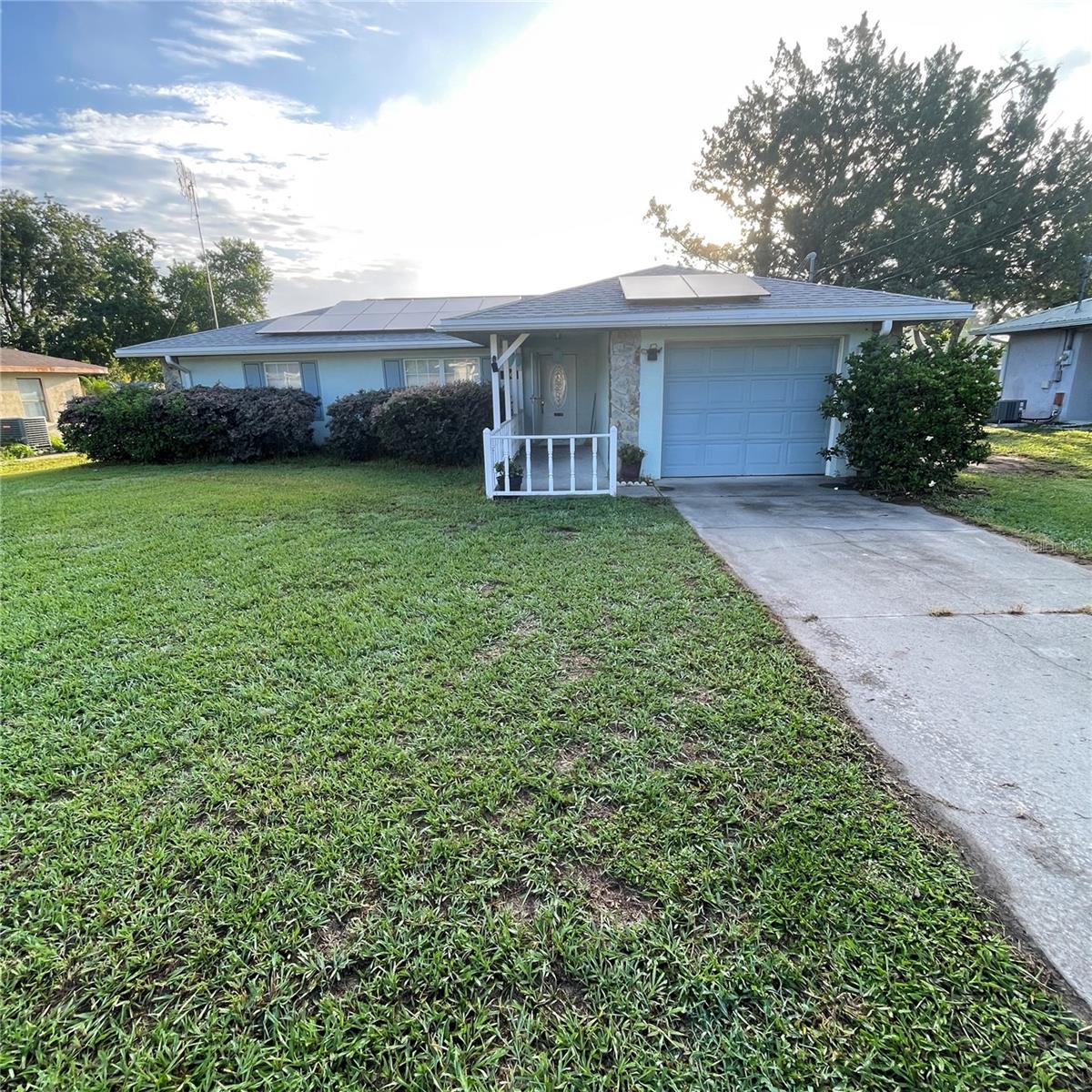Charming 3BR/2BA Split Floor Plan Block Home – No HOA, Solar-Powered,
Self-Sufficient + 1-Year Warranty.
Welcome to this thoughtfully designed 3 bedroom, 2 bathroom block home featuring a split floor
plan making it perfect for multi-generational families or hosting guests comfortably. Located in a
quiet, no-HOA community this home offers efficiency and independence.
Solar panels will significantly lower your electric bills—owners often save hundreds each year
thanks to net metering and solar generation. Electric bill is only about $40 each month! You’ll enjoy a newer roof and HVAC
system—major expenses already handled for your peace of mind. Self-sufficiency is another
standout feature: enjoy independence with your own well and septic system, eliminating
municipal utility fees. The home includes a one-year home warranty, adding an extra layer of
protection and reassuring buyers that unexpected service costs are covered.
Inside, you’ll find a tiled bath, a tiled shower, and functional appliances ready for immediate use.
While the flooring is well-worn, the solid foundation beneath lets you invest in cosmetic
upgrades at your own pace. The layout flows onto a covered lanai—ideal for breakfasts or
BBQs while overlooking a large, fenced backyard, providing space for pets, play, or relaxation.
Key Features:
3 bedrooms, 2 full bathrooms. Quiet location with NO HOA fees. Solar panels: lower monthly electric bills with net metering savings. Private well & septic: independence from municipal utilities. Newer roof and HVAC. Durable block construction with tile baths. Covered lanai and spacious fenced yard. Appliances stay with home—move-in ready. Original flooring, ready for your upgrade vision