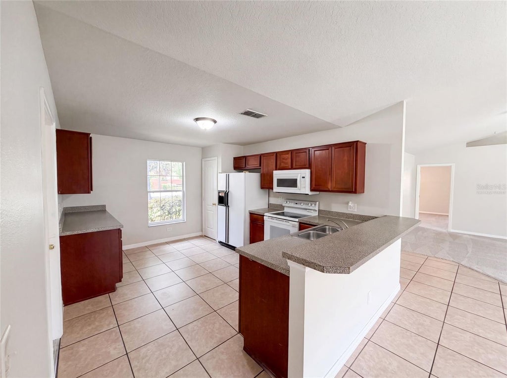 Photo of 306 Garden Oak Court, Apopka, FL 32703 (MLS # O6427194)