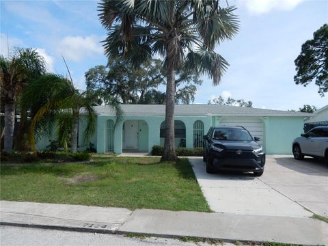 Photo of 7124 Ashwood Drive, Port Richey, FL 34668 (MLS # TB8535811)
