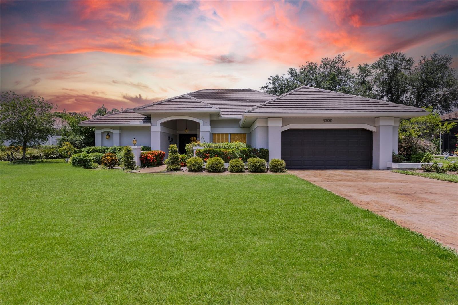 Experience luxury living at 12451 Gateway Greens Dr in Fort Myers. This elegant single-family home features 3 bedrooms, 3 bathrooms, and over 2,200 sq ft of thoughtfully designed living space. Enjoy custom marble floors, terrazzo finishes in the bathrooms, and a spacious layout perfect for entertaining. The gourmet kitchen opens to expansive living and dining areas, while the bonus room provides flexibility as an office, gym, or media space. Step outside to a private oasis with a resort-style pool, lush landscaping, and screened lanai. The home also features a new tile roof installed in 2020, providing peace of mind and lasting value. Located in the Gateway community, offering golf, tennis, pickleball, fitness center, clubhouse, dining, and miles of walking and biking trails. A rare opportunity to own a home with refined finishes and unmatched amenities in one of Fort Myers’ most sought-after neighborhoods.