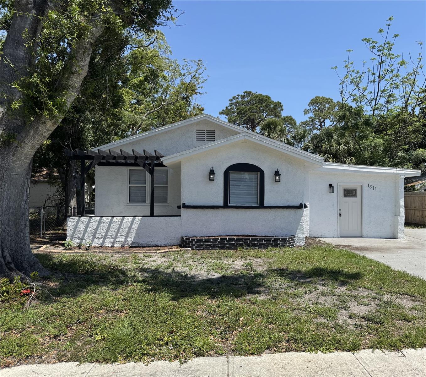 Welcome to your dream home in beautiful, sunny Sarasota. This fully renovated 3 bedroom, 2 bathroom home offers the perfect blend of modern style, comfort, and convenience just minutes from world famous Siesta Key Beach, vibrant downtown Sarasota, and top rated schools. Enjoy sleek finishes, new flooring, fresh paint, and stylish fixtures throughout. Fully renovated kitchen featuring stainless steel appliances, granite countertops, new cabinetry, and a sleek tile backsplash. This home offers 3 spacious bedrooms with ample closet space and 2 full bathrooms, both fully updated with stylish fixtures and finishes. The open concept living and dining area has plenty of natural light and is great for entertaining. Don't miss your chance to live in this beautifully updated home in one of Sarasota's most desirable areas. Schedule your private showing today!