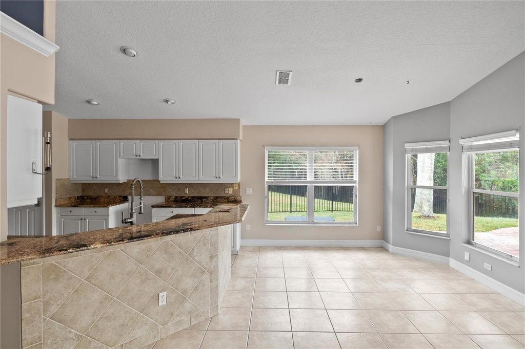 Photo of 52 Cormorant Circle, Daytona Beach, FL 32119 (MLS # O6375529)