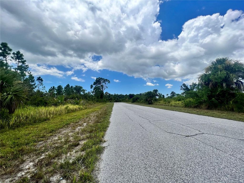 Photo of 12061 Grady Avenue, Port Charlotte, FL 33981 (MLS # C7495284)