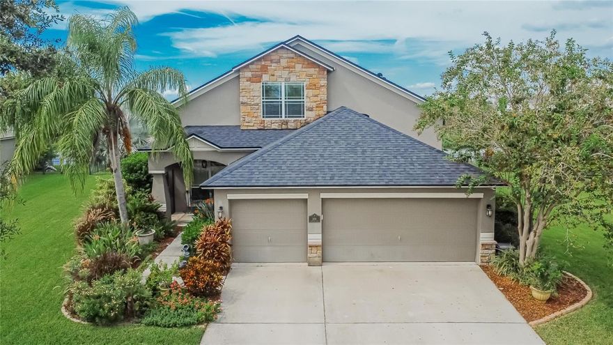 Live the Florida lifestyle you’ve been seeking in this gorgeous 4 bedroom, 3 bath, 3 car garage home in Harbour Isles. This home opens to a bright, open floor plan with elegant finishes throughout, starting with new, durable Luxury Vinyl Plank flooring and 5 1/2” baseboards. Four spacious bedrooms offer serene sanctuaries, with the primary suite and second bedroom conveniently located on the first floor.  Two more bedrooms and a bonus room are upstairs with the third bath. The primary bedroom’s en-suite bath with soaking tub and step-in shower has new ceramic tile flooring, upgraded white cabinetry, quartz countertop with undermount porcelain sinks, tile backsplash, and separate water closet with soft-close toilet (2025).  The second bath also has upgraded cabinetry, quartz countertop with undermount porcelain sink, tile backsplash, and soft-close toilet. The kitchen, overlooking the family room, was upgraded in 2022 with crisp, white cabinetry, a oversized island with seating for 3, quartz countertops, and stylish tile backsplash. Soft closing cabinetry with quartz countertops and tile backsplash were added in the dinette area to provide additional storage. Exit the family room via sliding glass doors to your private outdoor oasis. This resort-style entertainment area is showcased by a heated, in-ground saltwater pool and 8-person spillover spa, surrounded by a spacious travertine deck and lush landscaping. The pool has a tanning shelf, automatic cleaners, LED lighting, and both the pool and spa can easily be operated remotely via your cell phone. The covered lanai has an electric awning with LED lighting, a custom built dry bar with refrigerator, and curtains, should you wish to forego watching those majestic Florida sunsets.  Don’t miss the opportunity to make this extraordinary home yours!