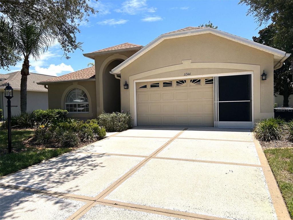 Photo of 11344 Heritage Point Drive, Hudson, FL 34667 (MLS # TB8522550)