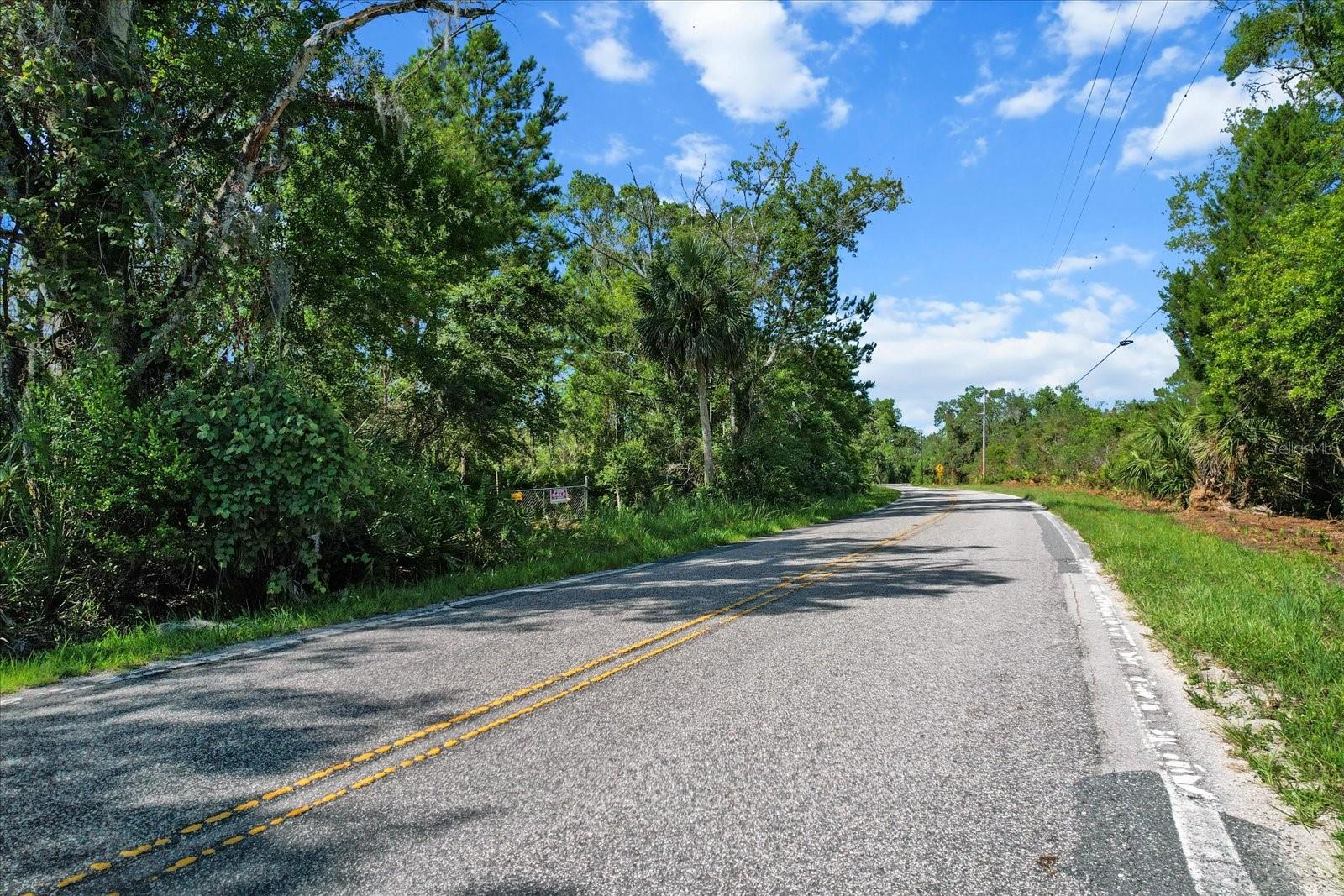 Build Your Dream Home on Florida’s Nature Coast!
Welcome to 10105 Ozello Trail in Homosassa — a rare opportunity to own a peaceful slice of paradise along one of Citrus County’s most scenic drives. This offering includes two separate parcels totaling 2.08 acres, giving you extra space, flexibility, and long-term potential for building, storage, or future resale.
The property features a tranquil pond that can be enhanced—dig it deeper to create a stunning water feature and use the fill dirt to elevate and level your homesite. Whether you're planning a raised Florida-style retreat or a tucked-away custom build, this land offers the natural beauty and layout to make it happen.
Utilities are nearby: public water is available with an estimated hookup cost of $3,000, and electricity can be run to the lot for approximately $300, were estimated costs provided to the previous owner. A septic system will be required, as is typical in the area.
For water lovers, this location is unbeatable. Just minutes from the Gulf, you’ll enjoy easy access to world-class fishing, boating, kayaking, and scalloping in the waters of Homosassa and Crystal River. Public boat ramps are close by, and Fort Island Gulf Beach is a short drive away for beach days and sunset views. You’ll also find nearby attractions like Homosassa Springs Wildlife Park and waterfront dining that captures the charm of Old Florida.
The property is zoned for site-built homes only — mobile and manufactured homes are not allowed — helping preserve the natural feel and quality of the area.
With its size, features, and prime location, this land is ideal for a full-time residence, vacation home, or weekend escape. Come experience the Nature Coast lifestyle — schedule your visit to 10105 Ozello Trail today!