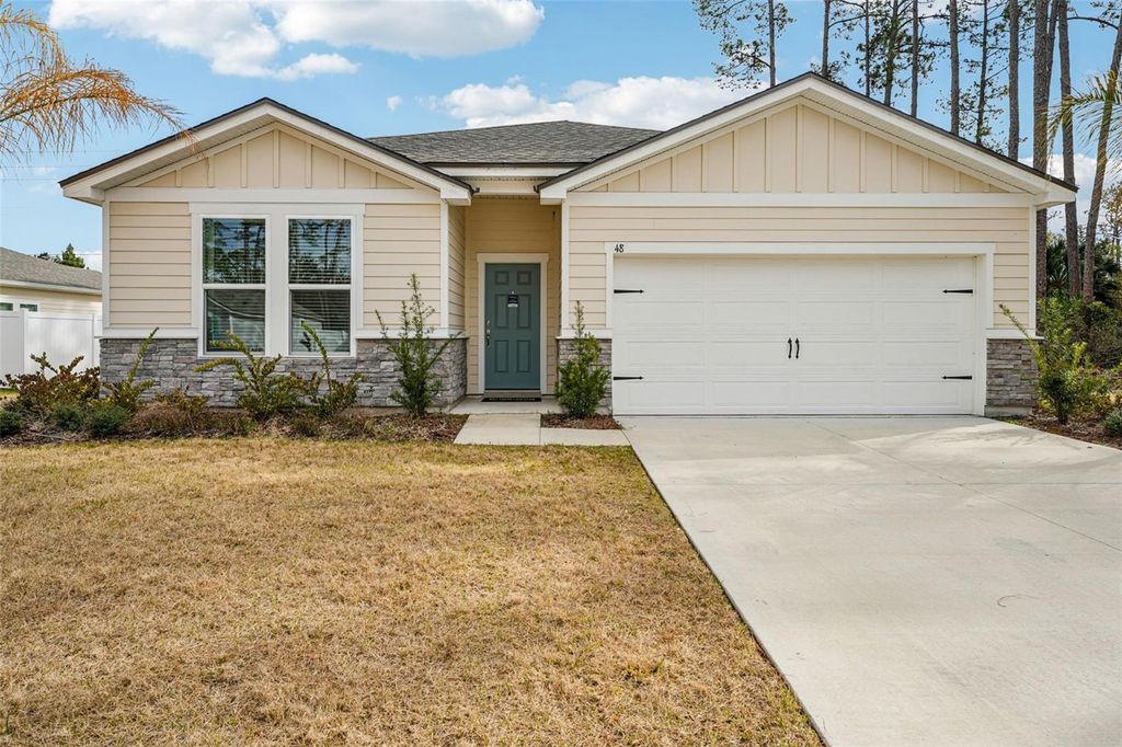Photo of 48 Bradmore Lane, Palm Coast, FL 32137 (MLS # O6383674)