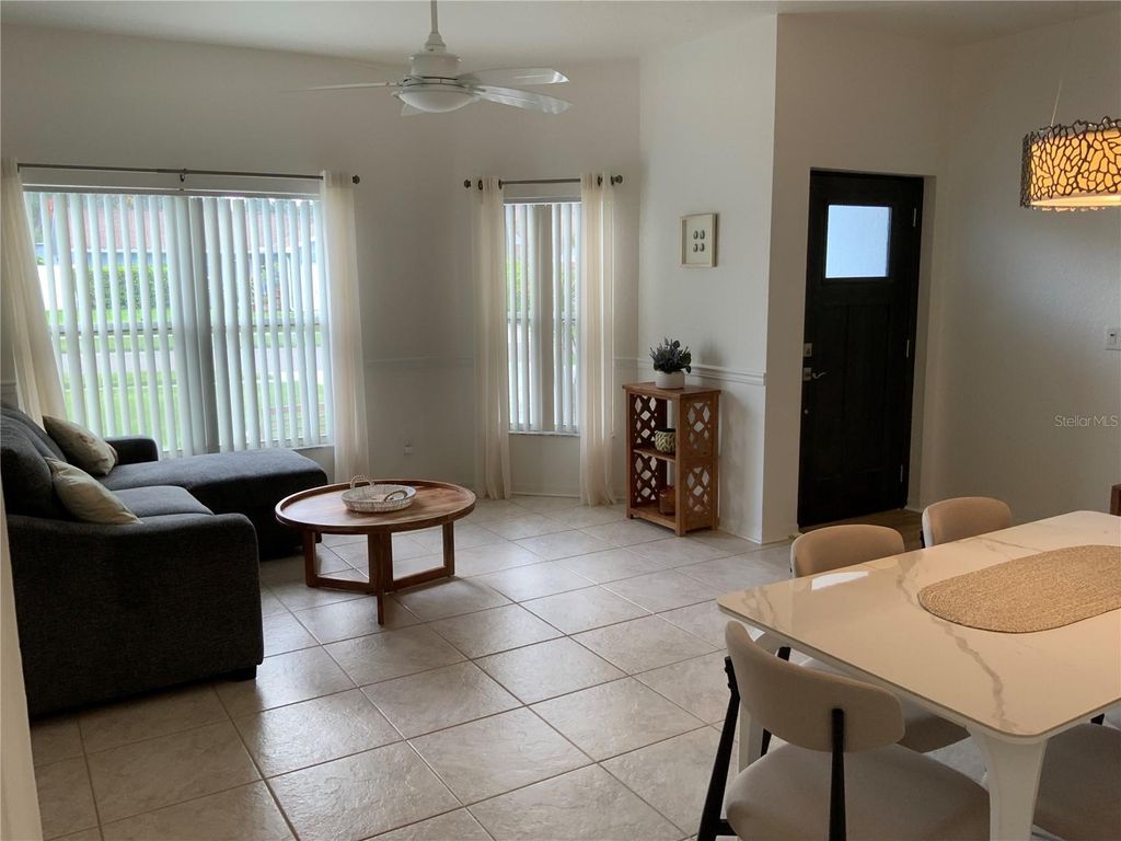 Photo of 1594 Coastal Place, Dunedin, FL 34698 (MLS # TB8412366)