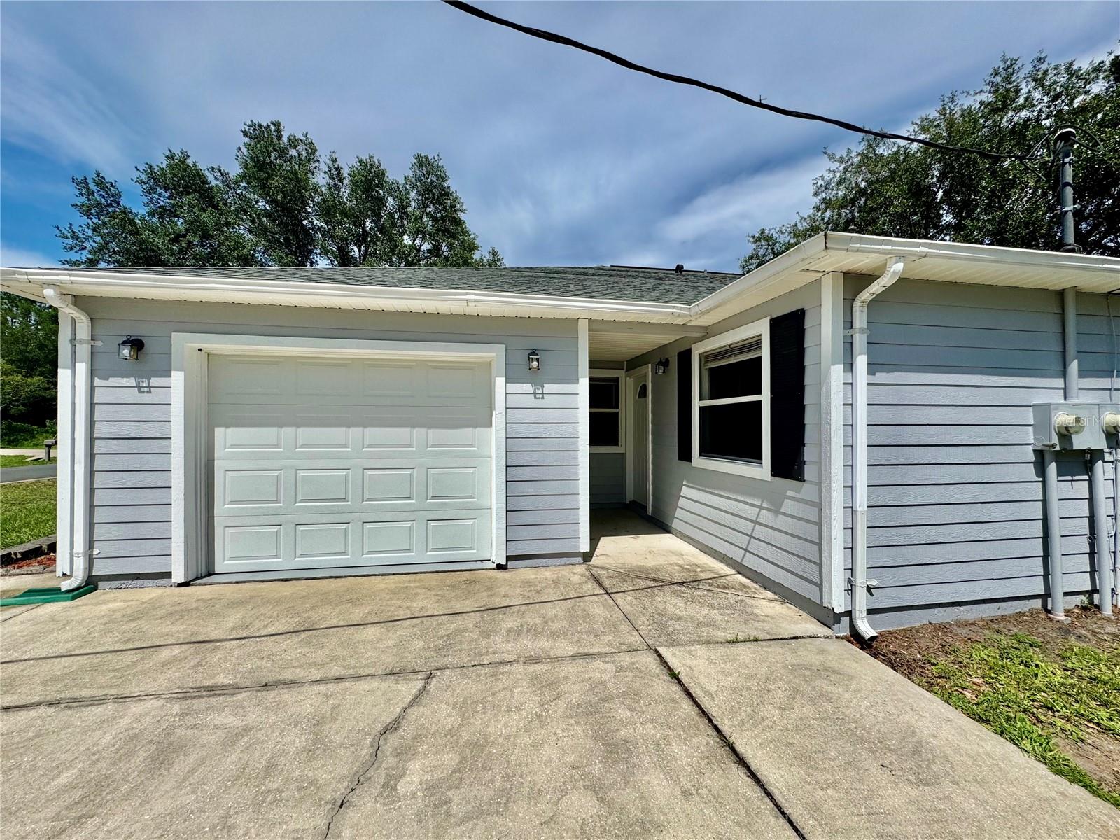 Excellent Investment Opportunity! This updated duplex features two spacious units, each offering 3 bedrooms, 2 bathrooms, and a 1-car garage. Recent improvements include new kitchens with granite countertops and stainless steel appliances, new flooring in the bedrooms, and a new roof installed in December 2023. Conveniently located near schools, shopping centers, churches, I-95, and the hospital, this property is ideal for attracting quality tenants or accommodating multi-generational living. With open floor plans, generous living space, and private garages, this duplex is a versatile and reliable investment.