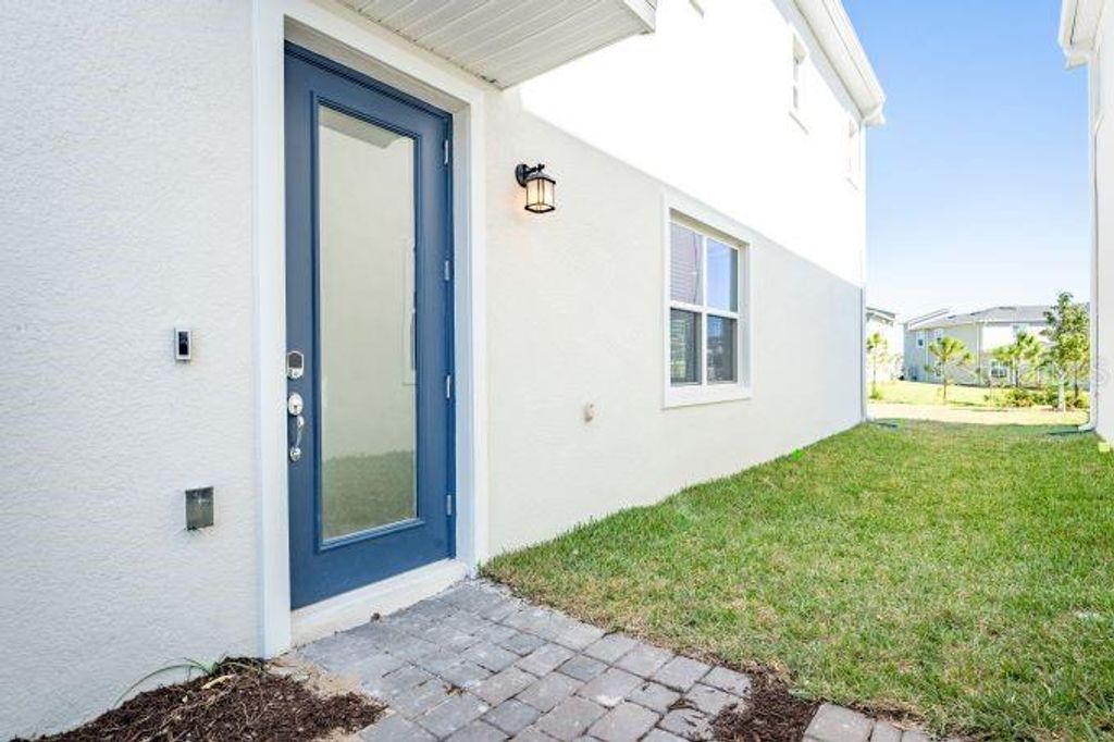 Photo of 307 Nine Iron Drive, Davenport, FL 33896 (MLS # O6369749)