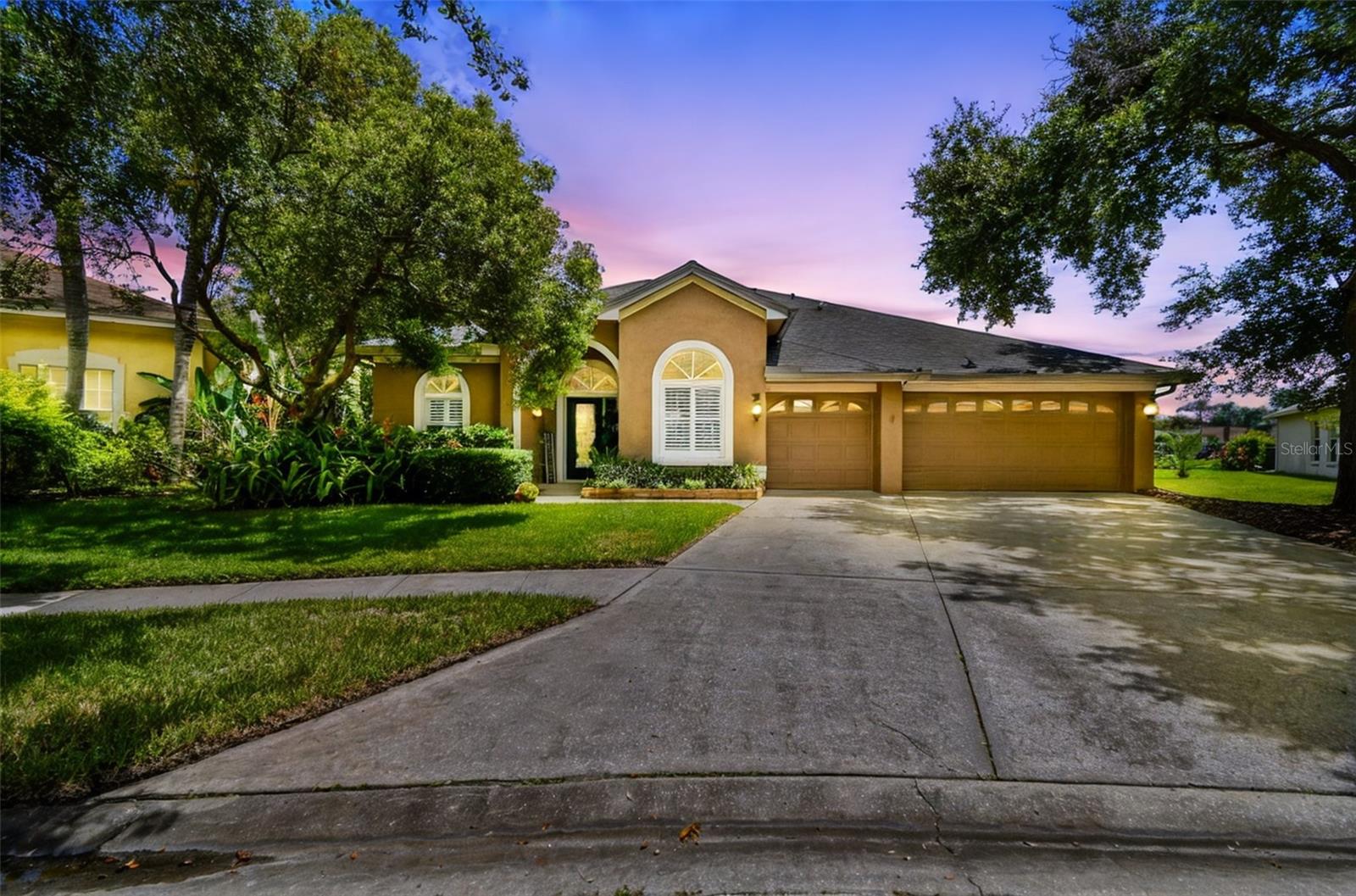Welcome to your dream home in the prestigious Stamford Village at The Fords at Westchase. This beautifully upgraded 4-bedroom plus office, 3-bathroom, 3-car garage with a pool and spa offers 2,322 square feet of stylish and comfortable living space on a 79 x 121 pie-shaped lot. Breathtaking pond views and unforgettable sunrises and sunsets await you!
Step inside and be greeted by a newly painted (2025) light-filled floor plan featuring 8x48 plank ceramic tile floors (2024) and plantation shutters throughout. The remodeled kitchen boasts gorgeous waterfall granite countertops, a new backsplash, matching under-bar glass mosaic tile, a new glass pantry door, can ceiling lights, and newer stainless steel appliances. The open-concept family room is anchored by a sleek 36x72 Bianco Onice porcelain tile accent wall and an electric fireplace that not only elevates the space but also warms it up. The TV and bracket are included.
The spacious primary suite features two walk-in closets each with its own storage system, sliding glass doors to the pool and pond view, plantation shutters, and a fully renovated spa-like en-suite (2018). The en-suite boasts granite counters, new vanities, fixtures, tile flooring, a stunning tiled shower with glass doors, and a spectacular garden tub. Both secondary bathrooms have also been refreshed with new granite, new vanities, new mirrors, light fixtures, and one features a walk-in shower with pool access.
Outdoors, relax or entertain on your extended L-shaped screened lanai with pavers. Enjoy the TV and a resurfaced (2021) pool and spa overlooking a tranquil pond filled with Florida wildlife sightings. This spacious outdoor retreat was power washed and resealed in April 2025, providing resort-style living right at home.
Additional upgrades include: HVAC system 2023, garage door openers 2023/2025, water heater 2024, pool heater 2025, security system with RING Doorbell installed, roof installed in 2015, gutters installed around the house, washer, dryer, and all appliances, light fixtures, and fans included.
This desirable community is conveniently located within walking distance or a short drive of parks, trails, top-rated schools, and a variety of fantastic dining and shopping options. Major Interstates and Expressways are just minutes away, making it easy to commute to nearby beaches, the airport, and downtown.
This meticulously maintained, one-of-a-kind property offers a rare opportunity to experience luxury living with a serene water view in the heart of Westchase. Don’t miss out on this property—schedule your private showing today.