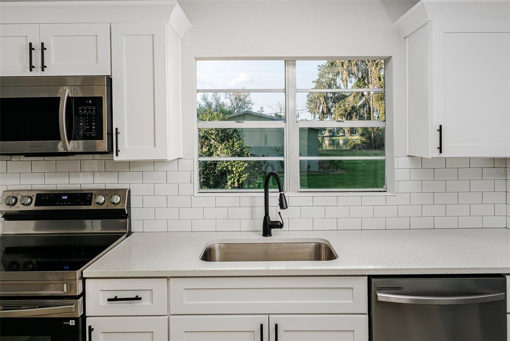 Photo of 521 N Tecumseh Avenue, Fort Meade, FL 33841 (MLS # L4965429)