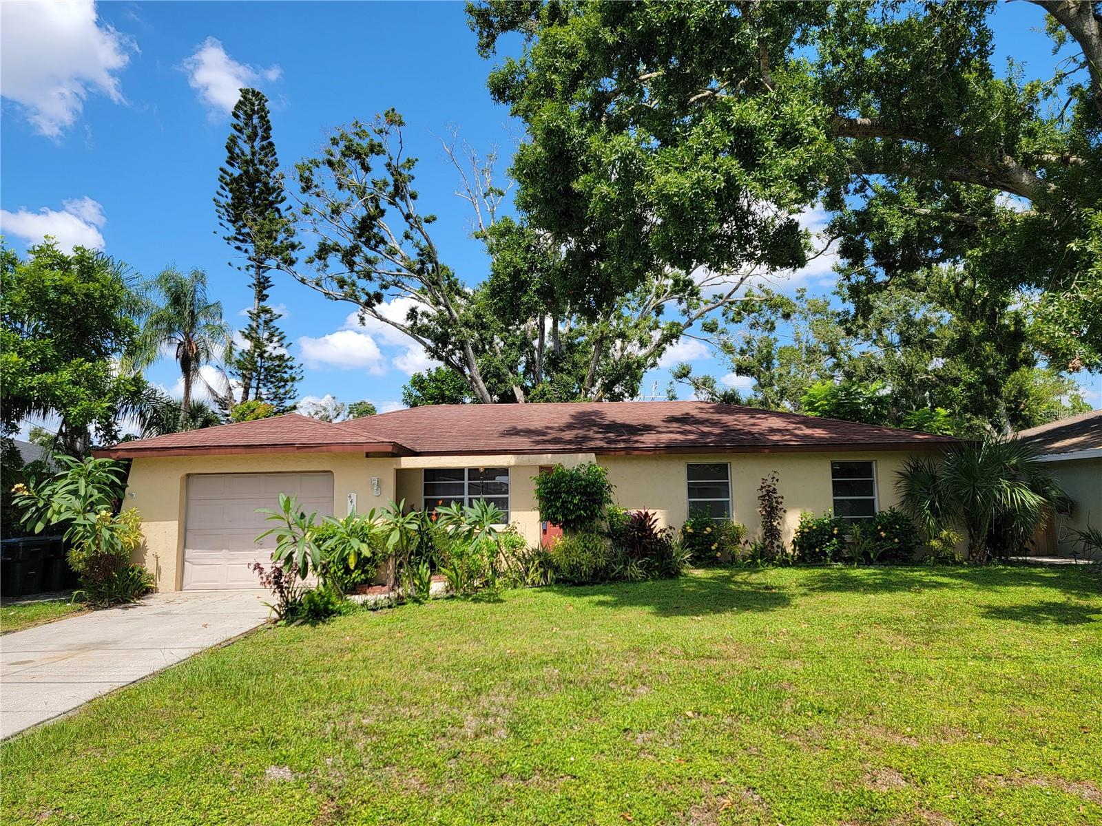 **THIS COULD BE THE ONE YOU'VE WAITED FOR!!** Solid 3BR/2BA Sarasota Springs home with an attached garage and a fenced backyard. Both baths have been tastefully updated with new vanities and tiled shower areas. Newer AC and some new LED light fixtures and EZ care quality laminate floors throughout the main living areas and bedrooms. The house has a cozy and warm feel to it. There's also a small wood deck off the dining area and a storage shed in the back yard for your lawn tools and mower. Entry way has nice landscaping and a unique courtyard feel. Located in very heart of Sarasota, you'll be pleased that everything is just 10-15 minutes away! So many things to appreciate....all that is missing is YOU! EZ to show and EZ to Buy!! Motivated Seller!!!