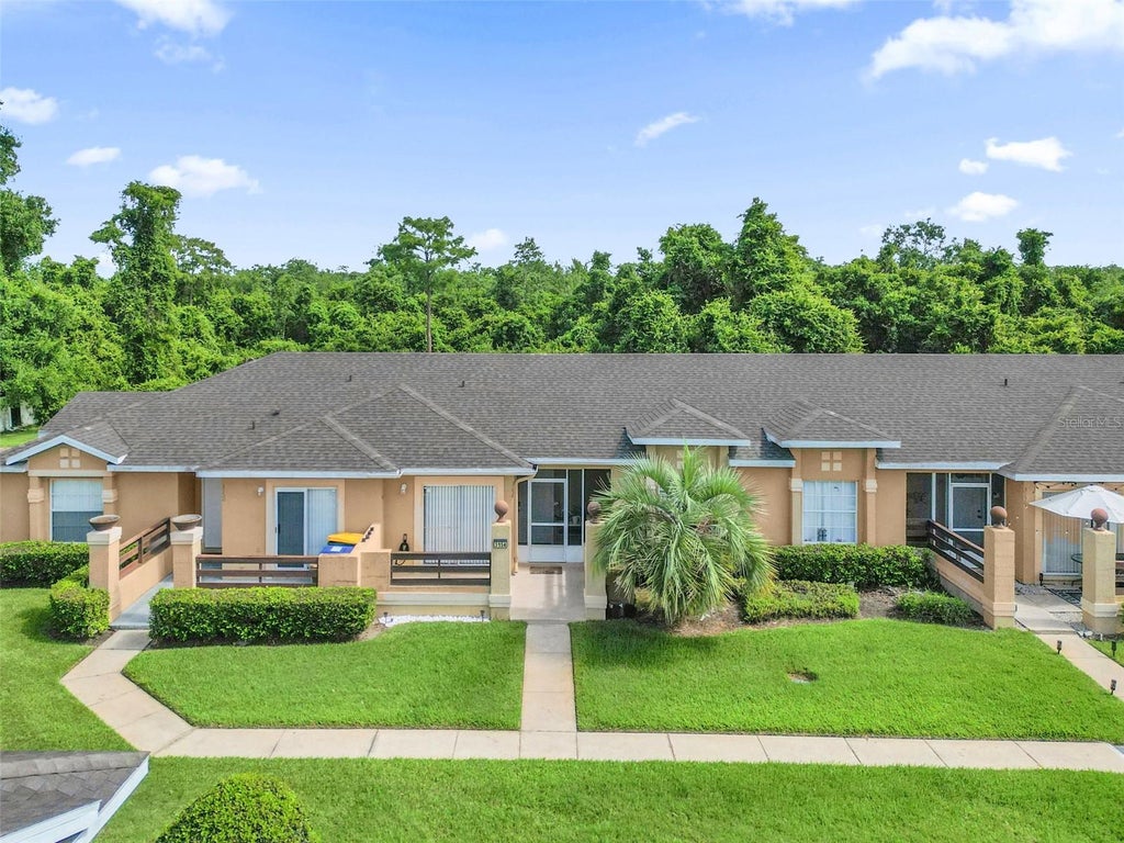 Photo of 3154 Sandy Shore Lane, Kissimmee, FL 34743 (MLS # O6414552)