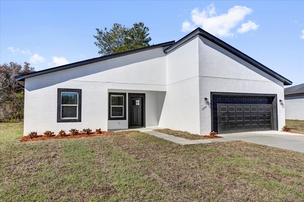 Photo of 13592 SW 40 Circle, Ocala, FL 34473 (MLS # O6373468)