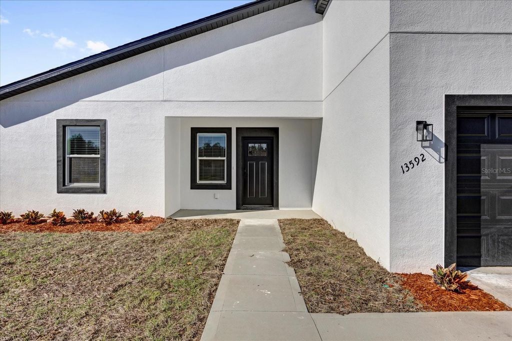 Photo of 13592 SW 40 Circle, Ocala, FL 34473 (MLS # O6373468)