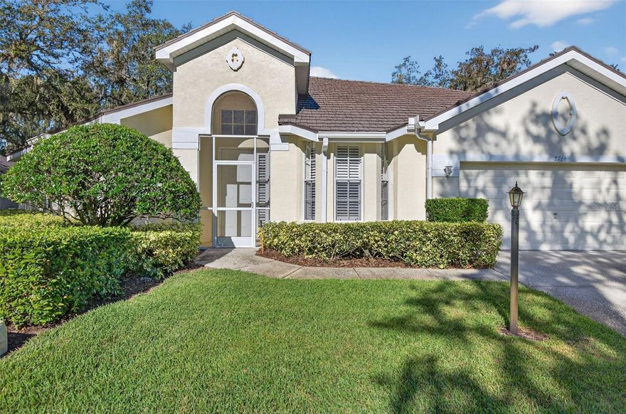 Unique single family detached "condo" in the highly sought after community Laurel Lake. Gracious foyer welcomes to this bright and open floor plan. Beautifully appointed with plantation shutters throughout the home. Spacious great room with dining/flex space, updated kitchen with nook. Primary bedroom features 2 walk in closets, updated en-suite bath with garden tub, separate shower and dual vanities. Enjoy the under roof lanai with extended screened patio. This home has been beautifully maintained by original owners. Kitchen updates feature custom cabinetry, granite and stainless appliances. Update primary bath includes new shower with no seam glass enclosure, classic cabinetry, granite and lighting. The unit has a high end aluminum metal roof and the A/C was replaced in 2025. Incredibly low $182.00 monthly fee includes lawn care, shrubbery, irrigation, tree trimming, private roadways, gated entry, escrow reserves and professional management. Located in the Walden Lake neighborhood featuring lakeside park, 6+ miles of trails, playground, fishing pier, sports complex and community dog park.