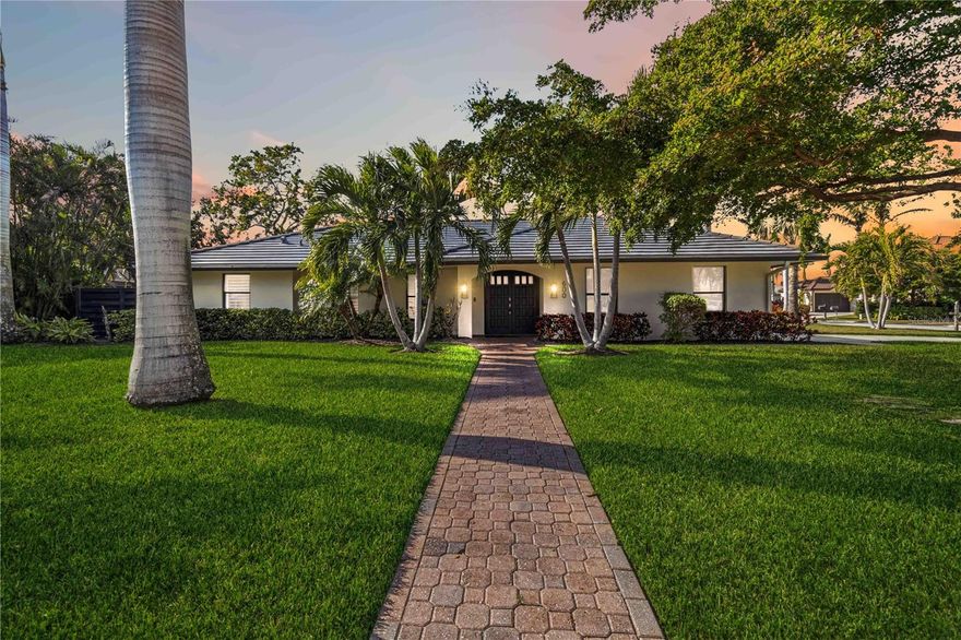 Paradise Found! This impeccable coastal-style retreat in the coveted Bird Key neighborhood offers the perfect blend of luxury and comfort in one of Sarasota’s premier locations. Ideally situated between vibrant downtown Sarasota and the beachy charm of Lido Key/St. Armands, this home is designed for effortless Florida living.
Set on an expansive almost 1/3-acre corner lot on Owl Drive, this 3-bed, 3-bath, 2,300 sq. ft. pool home has been meticulously maintained and thoughtfully revitalized. Recent updates include new flooring in the living room, kitchen, dining, and laundry rooms, a brand-new roof (December 2024), stunning new granite countertops in the kitchen, and a remodeled bathroom accessible from the den. Fresh interior and exterior paint, along with a newly painted fence, further enhance the home’s appeal.
From the moment you step inside, you'll feel the fresh and inviting atmosphere with magazine-worthy style. The neutral palette created by the white oak flooring complements any décor style. The entertainer’s kitchen features wraparound stone countertops, offering ample seating for casual gatherings, along with stainless steel fridge, Bosch dishwasher, and custom cabinetry.
Adjacent to the kitchen and dining area, a flexible space can serve as a study, gym, or hobby room. The primary suite is a serene retreat with custom walk-in closets and a beautifully redesigned shower featuring stone and river rock accents. The split floor plan ensures privacy for guests with two additional suites furnished to perfection.
Step outside and experience true Florida living with a seamless transition to your outdoor oasis, complete with a pool, spa, oversized fenced yard, and lush landscaping. Additional features include an oversized laundry room, a side-entry garage, and modern upgrades such as plantation shutters, contemporary lighting and fans, newer AC (2022), water heater (2022), pool screen (2023), pool pump and automation (2023), epoxy garage floors, and storage racks (2020).
Enjoy low HOA fees and no CDDs while embracing the Bird Key lifestyle—whether it’s walking the iconic Ringling Bridge, indulging in water sports at Bird Key Park, or dining and shopping just minutes away at St. Armands Circle and Lido Beach. For those seeking a social and boating lifestyle, the Bird Key Yacht Club offers exceptional amenities including boating, dining, tennis, and events.
Don't miss out on this extraordinary opportunity to own a piece of paradise!
