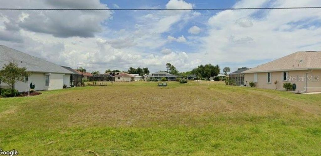 Photo of 157 Bunker Road, Rotonda West, FL 33947 (MLS # O6327884)