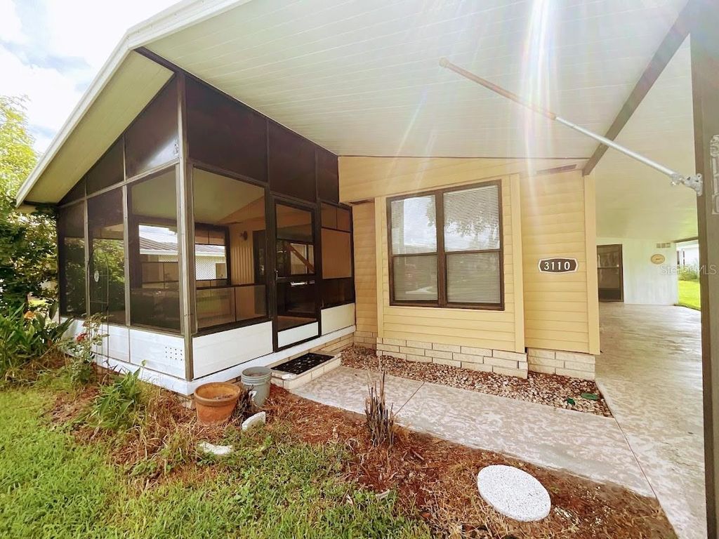 Photo of 3110 Hidden Lake Drive, Wesley Chapel, FL 33543 (MLS # TB8416474)