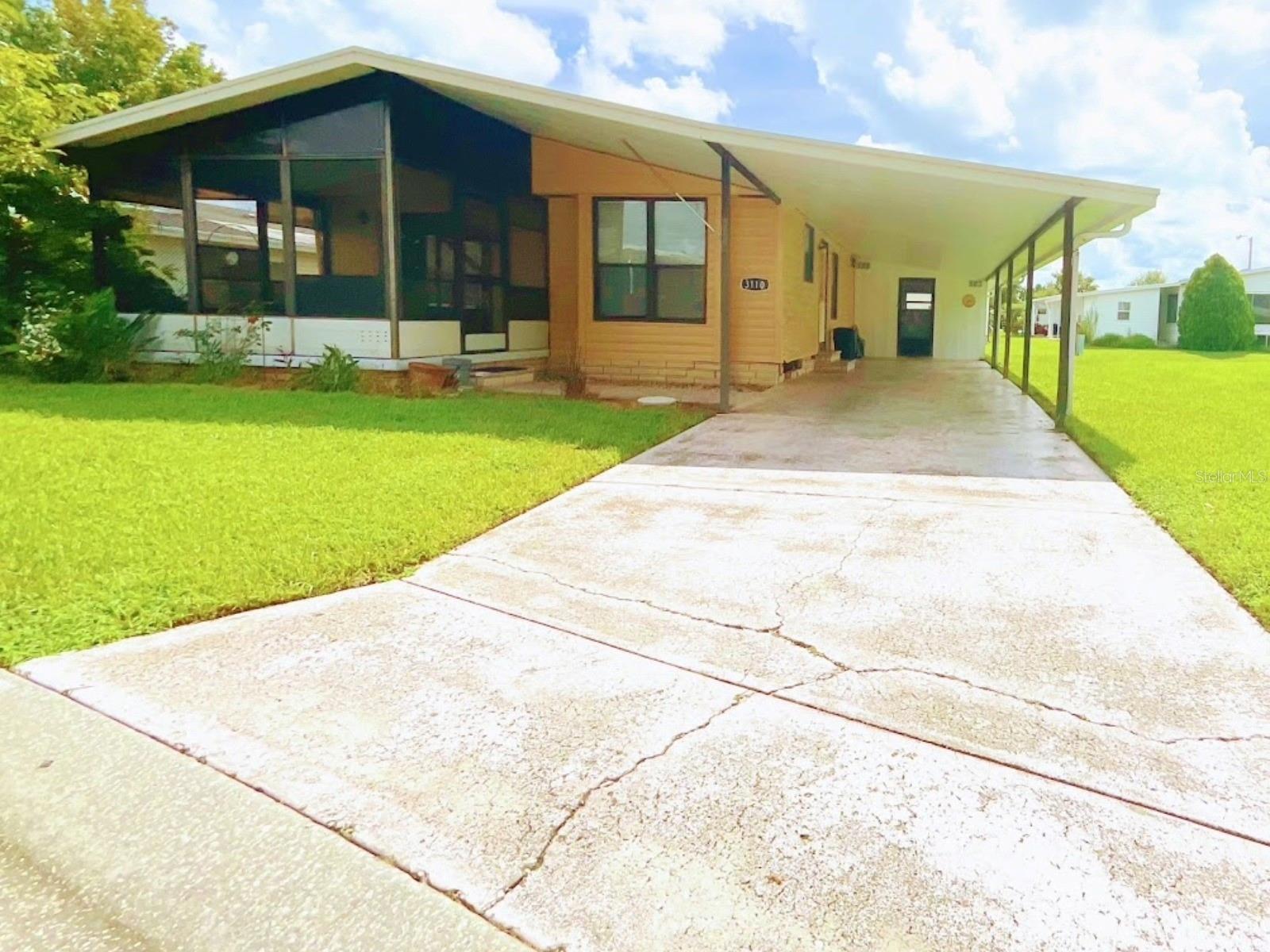 Sit in your garden: Enjoy the pond and the fresh Florida air. Beautiful and bright home in Timber Lake Estates with 2 bedrooms, 2 bathrooms, a spacious eat-in kitchen, indoor laundry for convenience, a front sunroom, and a 2-car garage with storage space at the end. Fantastic community with a clubhouse and 2 private Publix pools. No age restrictions, affordable HOA fees. A background check (costing $50 per person) and a personal interview are required for acceptance. The property cannot be rented due to exceeding the rental limit. However, you can be listed for when this changes so you can rent your property. See attached rules and regulations. Come see this GREAT property today.