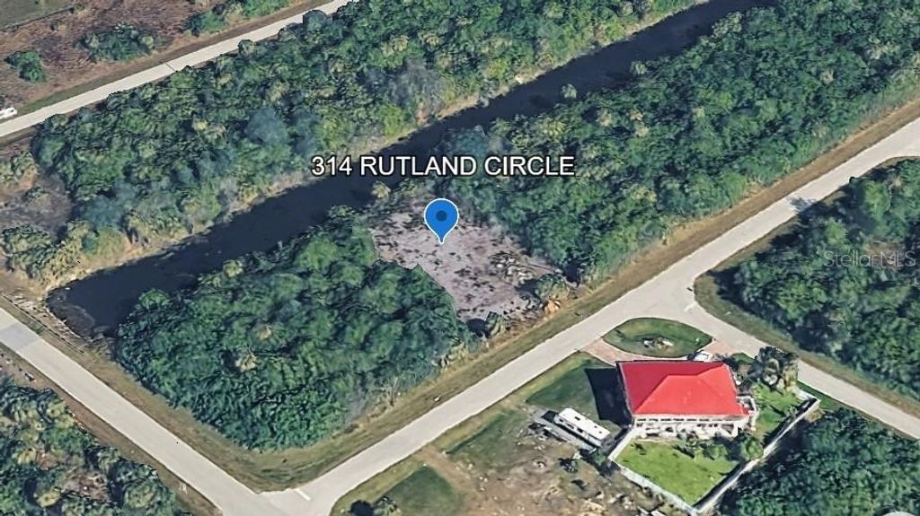 Photo of 314 Rutland Circle, Port Charlotte, FL 33954 (MLS # C7528728)