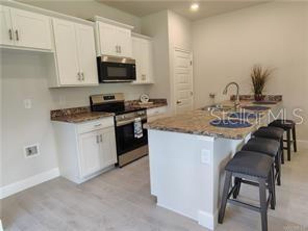 Photo of 231 Bittern Loop, Inverness, FL 34453 (MLS # OM722178)