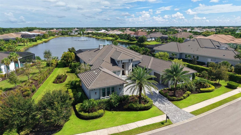 Photo of 8339 Lucerne Loop, Bradenton, FL 34202 (MLS # A4701403)
