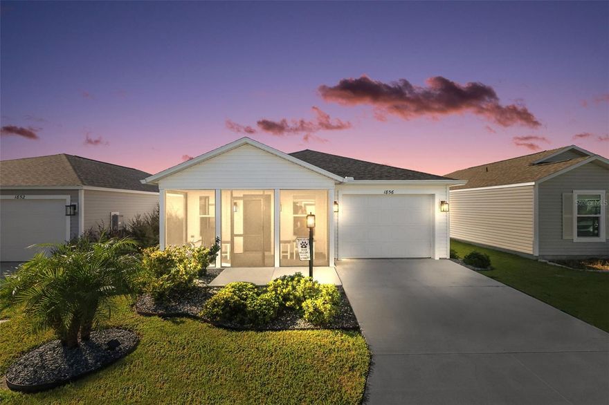 FABULOUS, METICULOUSLY MAINTAINED 2/2 Hideaway Villa with SCREENED FRONT LANAI, VAULTED CEILINGS, and INTERIOR LAUNDRY located in the Walker Villas in the VIBRANT Village of Moultrie Creek! FANTASTIC LOCATION! - JUST MINUTES from the upcoming Eastport Town Center! Built in 2024, this nearly NEW home offers LOW-MAINTENANCE peace of mind with CONTEMPORARY DESIGN! TROPICAL Florida landscaping with EASY-CARE STONED beds welcome you into the CHARMING FRONT SCREENED PORCH. This wonderful room is the perfect spot for ENTERTAINING friends and family or simply RELAXING with your morning coffee, evening cocktail, or a good book! Step through the front door into the OPEN CONCEPT floor plan of the living, dining, and kitchen boasting SEAMLESS LUXURY VINYL PLANK FLOORING and HIGH VAULTED CEILINGS that create a SPACIOUS and VOLUMINOUS main living area. This AMAZING home combines comfort, functionality, and style with MODERN amenities THROUGHOUT. The kitchen is a chef’s dream with GORGEOUS GREIGE cabinetry,  NEUTRAL countertops, STAINLESS appliances, GAS range, PANTRY closet, and an EXPANSIVE CENTER ISLAND - perfect for meal prep and casual EAT-IN dining. The primary suite boasts DOUBLE windows for an ABUNDANCE of natural light and a GENEROUS WALK-IN closet. Its en-suite bathroom features GREIGE cabinetry with NEUTRAL tops, and a WALK-IN shower with sliding glass doors for a spa-like experience. The second bedroom is perfect for guests or a home office and offers a BUILT-IN closet. Bathroom two features GREIGE cabinetry with NEUTRAL tops, a tub and shower combination, and a hallway LINEN closet. A centrally-located, CONVENIENT, INTERIOR laundry closet offers additional shelving for EXTRA STORAGE needs. Completing the package is a one and half car garage with PLENTY of space for a car and a golf car! This home offers low-maintenance living and is ideal as a primary residence, vacation home, or investment property. Why wait to build when you can own right now! DON’T MISS YOUR OPPORTUNITY to make this AMAZING home in a FANTASTIC  LOCATION your own! The Village of Moultrie Creek is ideally located JUST MINUTES to Eastport Town Square and Middleton, where you’ll have easy access to shops, restaurants, and live nightly entertainment! Also close to Sawgrass Grove; Saluki and Olympia Recreation Centers; Shallow Creek Championship Golf Course; Shady Brook Pool; Farragut Softball Complex; Boosters Bar and Grill; Sophie Doodles Canine Park and much more! PLEASE WATCH OUR WALKTHROUGH VIDEO of this INCREDIBLE HOME and CALL TODAY to schedule your private showing or virtual tour!
