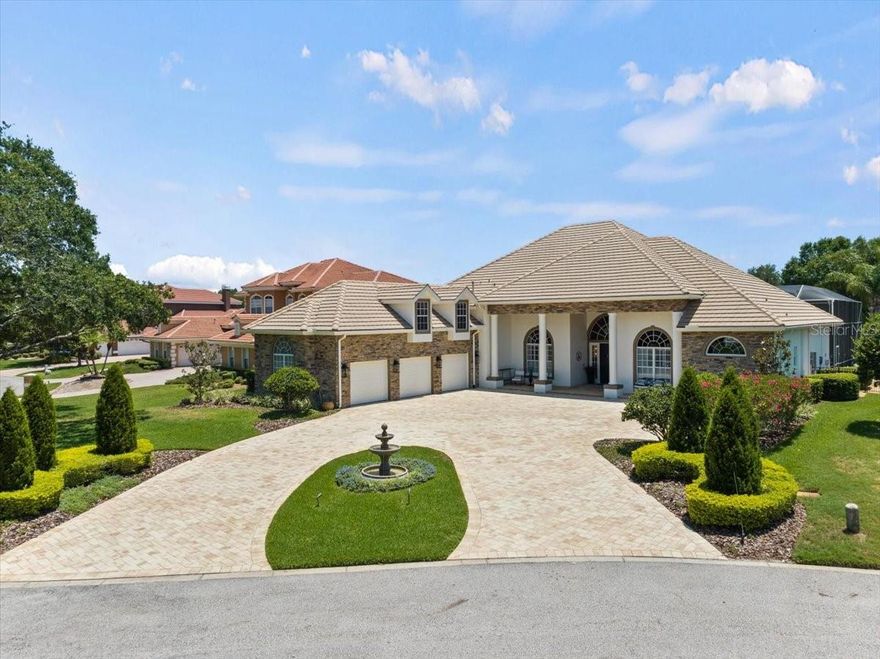 We are pleased to present this BEAUTIFULLY RENOVATED 6 bedroom plus study and bonus room, 5 bath, 4,855 sq. ft. home in Cheval! Situated on a SPECTACULAR WATERFRONT LOT WITH VIEWS OF THE TAMPA BAY TPC GOLF COURSE, this model like property features a light and bright open floor plan with exquisite décor and 16' ceilings! 
Updates over recent years include: a NEW KITCHEN with gorgeous cabinetry, SUB ZERO refrigerator, WOLF gas range, quartz counter tops, and enormous island; a BEAUTIFULLY UPDATED MASTER BATH with new cabinetry, freestanding tub, large walk in shower and dedicated water heater; REMODELED LAUNDRY ROOM with quartz counter tops, new cabinetry and refrigerator; NEW HARDWOOD AND PORCELAIN flooring; NEW FRONT ENTRY DOORS and NEW IMPACT SLIDERS in the family room. 
Since 2020, updates include: 3 NEW HVAC systems; 4 fully renovated secondary baths; 2 NEW TANKLESS HOT WATER HEATERS; SONOS sound system; NEW family room gas fireplace; NEW HOUSE GENERATOR; a FABULOUS POOL/SPA PACKAGE with NEW TRAVERTINE decking, NEW HEATERS (gas and heat pump), NEW pool surface and accent tile, iAquaLink control app, and NEW OUTDOOR KITCHEN and FIRE PIT; NEW exterior stone siding and paver driveway; NEW FENCE; NEW CAR LIFT and ELECTRIC CAR CHARGER and more! 
Cheval has 3 convenient entry gates, all of which are staffed 24 hours a day, seven days a week. Cheval also offers easy access to the private Cheval Golf Club and Athletic Center and to the TPC Club. Add to these GREAT SCHOOLS and a convenient location for shopping and interstate travel and you have a fantastic place to call home!