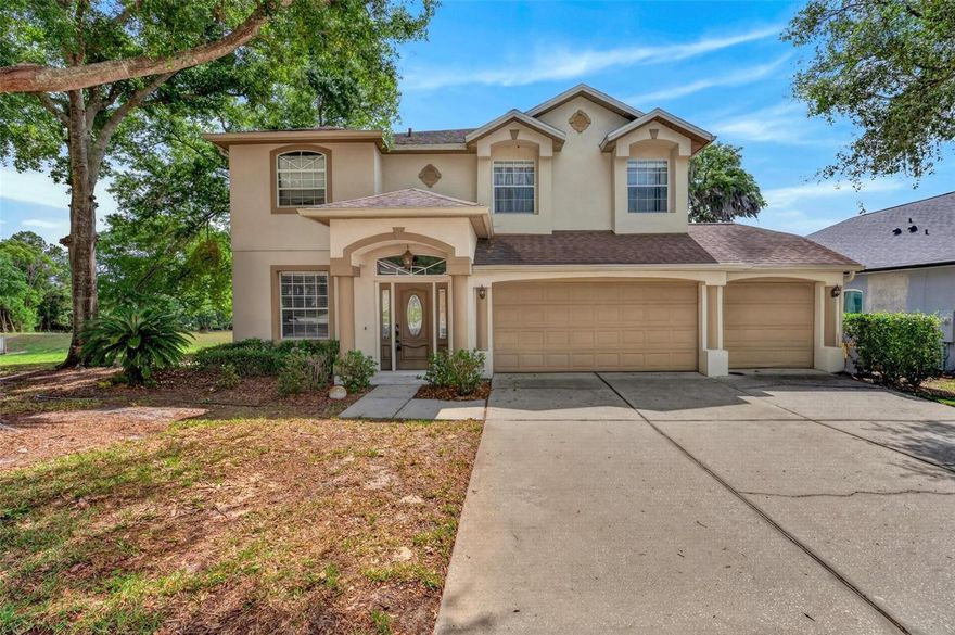 Wow! Step into this beautiful meticulously maintained home with stunning views of LAKE DAWSON, Timucuan golf course and moss in the large oaks swaying in the breeze from the lake. The breeze off the lake provides the perfect Zen atmosphere to enjoy reading a book or taking a nap. This 4-bedroom 3 bath, 3 car garage home located in sought after-gated Woodbridge Lakes is in the heart of Lake Mary. The area is the
hub of new medical facilities including the newly built Orlando Health Hospital, multiple ER facilities and all medical professions
needed. The 3017sq.ft. home features wood floors in the living, dining, family, primary bedroom with 10x10 sitting room and stairs.
Travertine in the kitchen and breakfast nook, updated kitchen with custom warm wood cabinets and room for 2 cooks, island, storage
galore and granite counter tops. Enjoy your morning coffee and the beautiful lake view sitting in the breakfast nook and looking
through the bay window. The oversized family room opened to the kitchen features French doors leading the 29x16 screened porch or
watch TV surrounded by the custom-built entertainment center. Upstairs and through the double door entry find the huge primary
suite with more stunning views of the lake. The 12x12 sitting area offers so many possibilities such as using it as a sitting area,
personal library, office, nursery or close in the partial wall and add a door for a 5th bedroom. After passing the 2 separate
spacious closets with California closet systems you enter the luxurious primary en-suite with a jetted garden tub to relax after a
hard day, a separate shower, water closet and a wall of custom cabinets for tons of storage. There are 3 other generously sized
secondary bedrooms and a bath with granite counters. Bedroom 4 offers more of those stunning lake views. A hallway off the family
room leads to the 3rd bathroom, the laundry room and the door leading to the 3rd car garage. All of this plus the community offers
a community area including a playground, bathrooms, relaxing areas and breezes from the lake. Minutes to I-4, 417, Heathrow
Business Park, shopping, fantastic dining, 30 minutes to Daytona Beach or quick trips to the attractions via the new SR429.
Everything you want located in a community friendly Florida suburb. The is the perfect place to call home!!