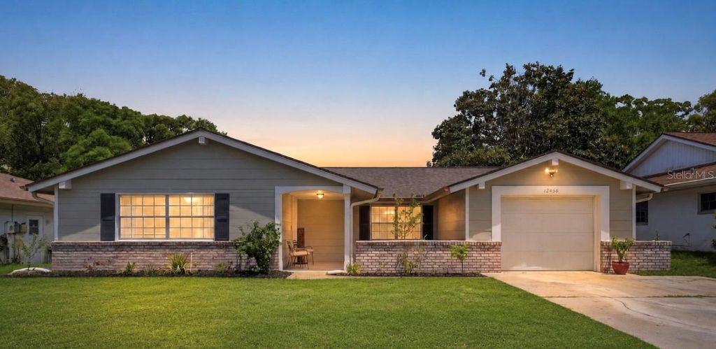 Photo of 12408 Stagecoach Lane, Hudson, FL 34667 (MLS # TB8529987)