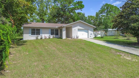 Photo of 5583 W Cagney Loop, Homosassa, FL 34448 (MLS # TB8544203)