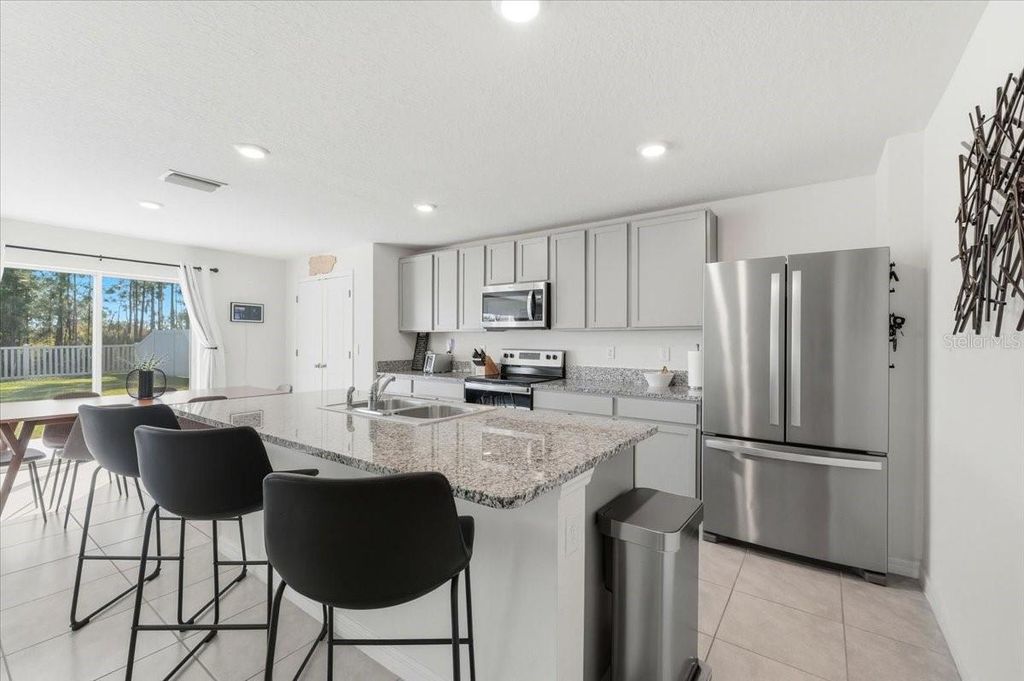 Photo of 1211 Tahitian Sunrise Drive, Plant City, FL 33565 (MLS # L4958238)