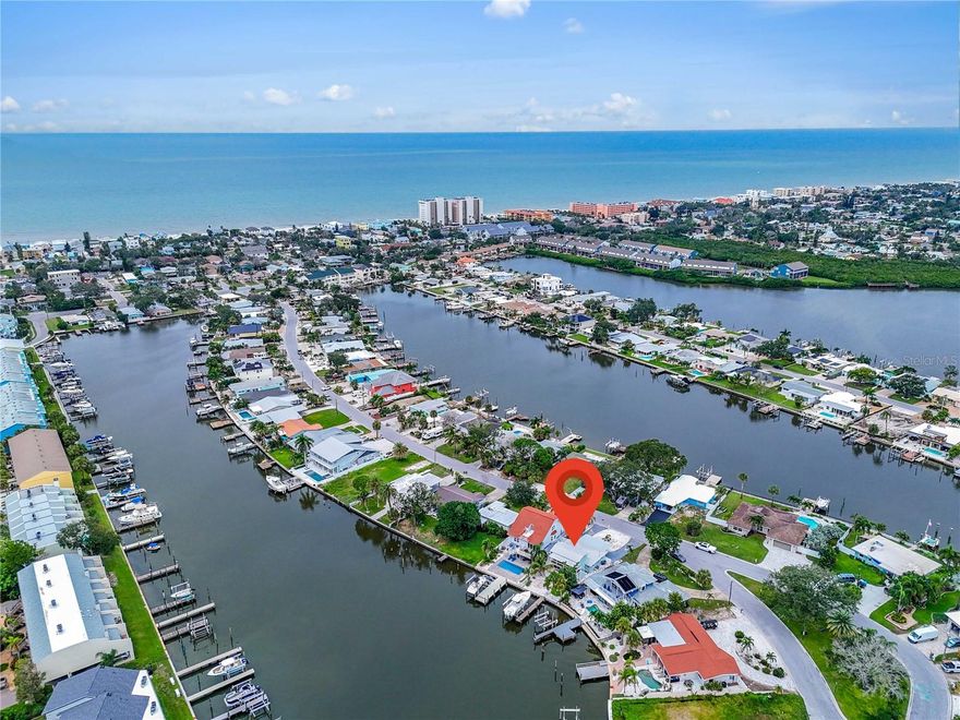 Waterfront Living Meets Investment Opportunity on Indian Rocks Beach

Looking for beautiful waterfront living or a strong income-producing property? This Indian Rocks Beach home offers both. Perfect as your personal coastal retreat or as a high-demand short-term rental, this property is truly turn-key. Nearly everything has been newly remodeled—from the HVAC system and durable metal roof to new impact windows, seawall, and a private dock. All the big upgrades are done—just bring your suitcase and your sunscreen.

If your a fishing or boating enthusiast, the home also includes a 16,000 lb. Sea Mount boat lift, making it easy to keep your vessel secure and ready for open-water adventures.

Step outside and take in sweeping waterfront views along the Intracoastal, where you can watch boats drift by in the morning and then walk just a short distance to the Gulf of Mexico for world-class sunsets. Indian Rocks Beach is known for its powder-white sand, turquoise waters, and laid-back coastal vibe, offering the best of both bayfront tranquility and Gulf-front adventure.

Enjoy kayaking, paddleboarding, and fishing right from your backyard, or stroll to the beach to soak in the Gulf breeze. Whether you plan to make this your year-round residence, a vacation getaway, or an income-generating short-term rental, this home provides an unparalleled opportunity to experience the ultimate Florida waterfront lifestyle.

Ready to move in. Ready to enjoy. Ready to rent.
