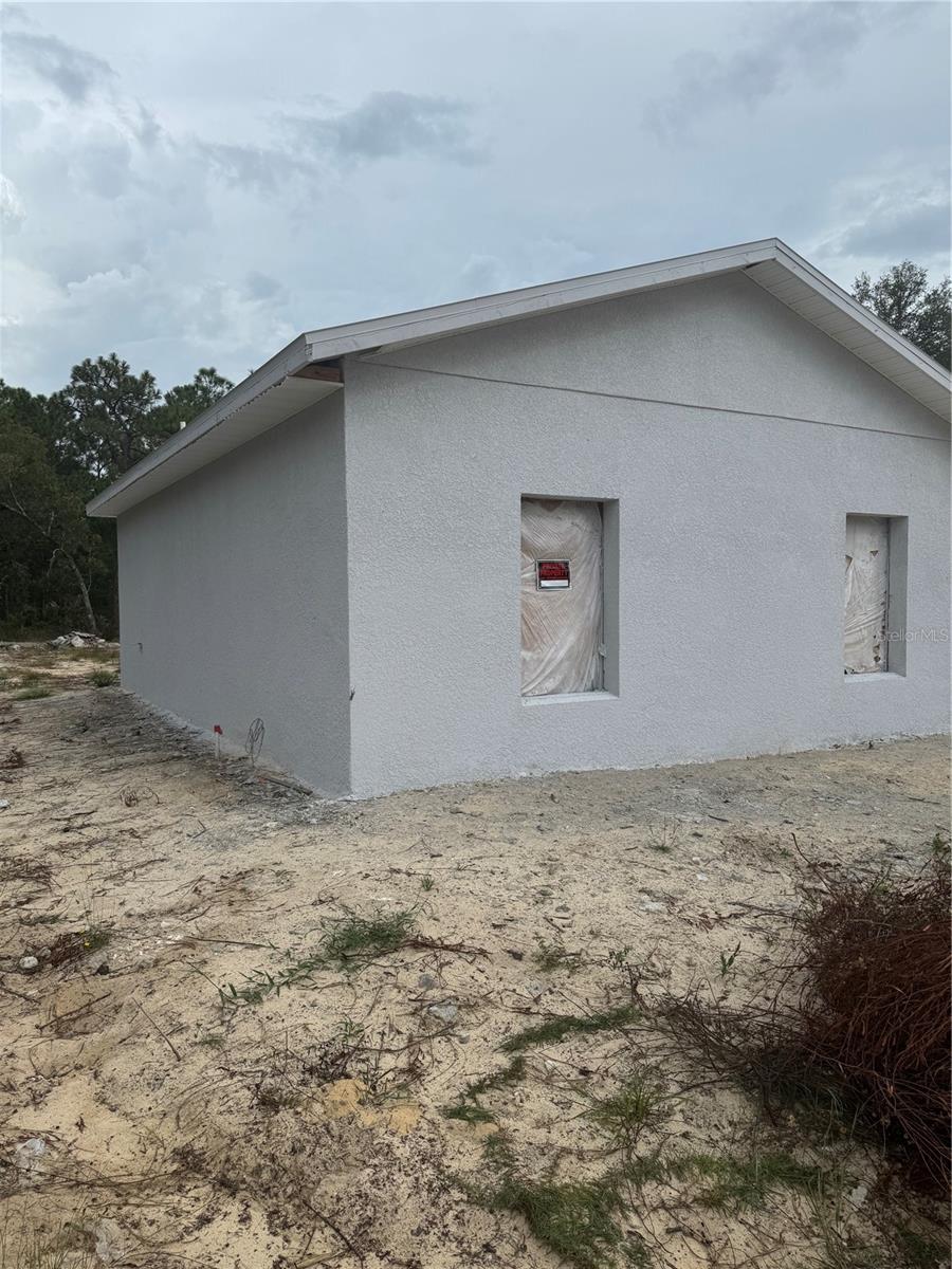 Photo of 16404 Cayman Road, Weeki Wachee, FL 34614 (MLS # W7890502)