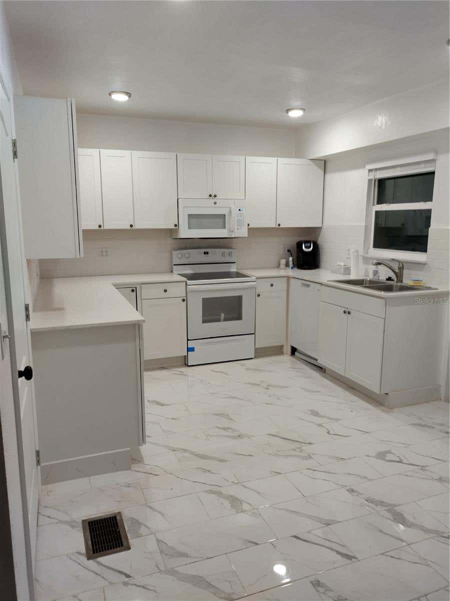 Photo of 405 S Ridgewood Avenue, Daytona Beach, FL 32114 (MLS # TB8523902)
