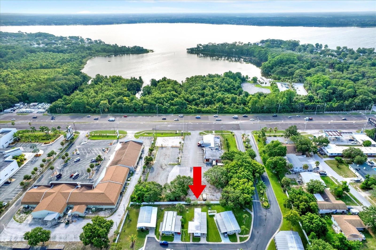 Welcome to your perfect Florida retreat! This beautifully maintained and completely furnished 2-bedroom, 1.5-bath single-wide mobile home features an open-concept layout, making it feel spacious, bright, and move-in ready. Enjoy peace of mind with all-new plumbing and a new roof installed in 2021. Step outside and relax on your screened-in porch, ideal for enjoying morning coffee or Florida evenings. Located in an amazing 55+ pet-friendly community, residents enjoy fantastic amenities—including a sparkling community pool.Conveniently located just minutes from shopping, restaurants, two popular beaches, and the world-famous Tarpon Springs Sponge Docks, this home is a true gem in a sought-after location. Whether you're seeking a winter escape or a full-time residence, this fully furnished home has everything you need to start living the Florida lifestyle today!
