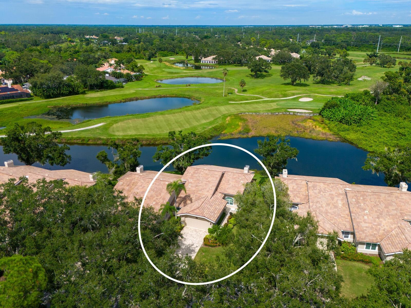 Views, Views, Views! Offers great panoramic water views, full of wildlife, and open views of the golf course beyond the water, nothing but water, rolling hills, and blue sky.The Gourmet Kitchen which is designed for the cook at heart with thoughtful upgrades, like granite countertops, premium Cafe appliances, and a 6-burner gas stove. Elegant living spaces with beautiful wood floors throughout, complemented by a working gas fireplace. The Meadows has three 18-hole golf courses, 14 Har Tru tennis courts, several pickle ball courts, a new fitness center, and a junior olympic pool. There are dozens of restaurants within 5 minutes at the UTC Mall and Benderson Park (World Championship Rowing). The Meadows has 15 miles of walking and biking trails, several dozen pristine ponds & lakes, and nearly 3,500 homes (consisting of various styles of condominiums, villas, and houses) uniquely placed with beautiful water views, golf courses, and awesome Spanish moss-clad oak trees, Palm trees, and picture-perfect mature landscaping. The Meadows is 20 minutes to beaches, the downtown arts, and St. Armands Circle. Walk to the most recent International rowing events at Nathan Benderson Park World Class Rowing & Aquatic Sports Arena, Whole Foods, and the worldly popular University Town Center Mall, and much more. A focus on keeping our wildlife and natural habitat is one of the assets which have made The Meadows one of the "top communities" in the USA! University Town Center, will soon have the grand opening of the new Mote Marine Aquarium.