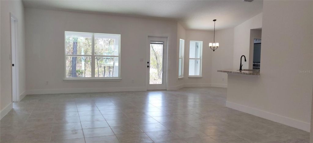 Photo of 12334 Snow Goose Avenue, Brooksville, FL 34614 (MLS # OM715209)