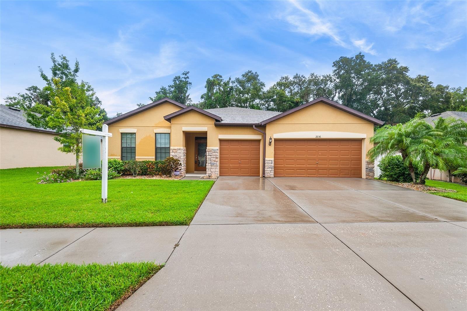 Welcome to your new home in the highly sought-after community of Valrico! This stunning property offers a blend of comfort, convenience, and luxury, perfect for anyone. The home features four spacious bedrooms and two well-appointed bathrooms, along with a dedicated office space ideal for remote work or study. With luxury vinyl plank and tile flooring throughout, there is no carpet to worry about. The modern kitchen provides ample cabinetry, and the open living spaces are perfect for easy entertaining. The generous 3-car garage offers plenty of storage and parking space. Outdoor living is a breeze with a fully screened-in back patio that includes additional cabinetry and a serene view of a wooded tree area. Centrally located, this home allows for a quick commute to downtown Tampa and is just minutes away from grocery stores, dining options, and retail shopping. Don’t miss this opportunity to live in a beautifully maintained home in a prime location. Contact us today to schedule a viewing!