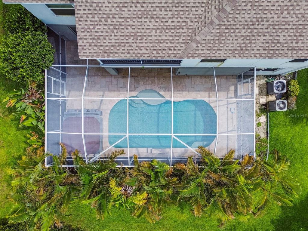 Photo of 216 Orange Mill Ave, Ruskin, FL 33570 (MLS # TB8410250)